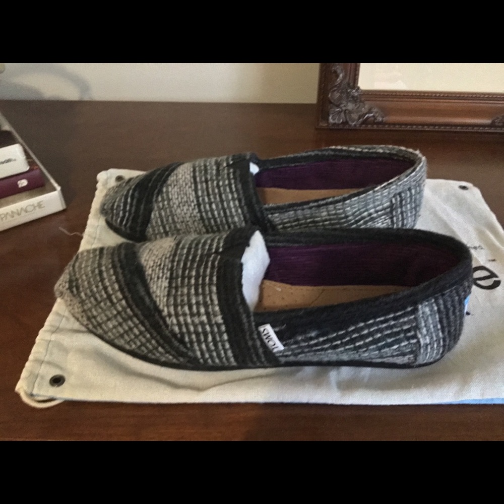 TOMS shoes with dust bag. Worn once. Size 8-1/2 W